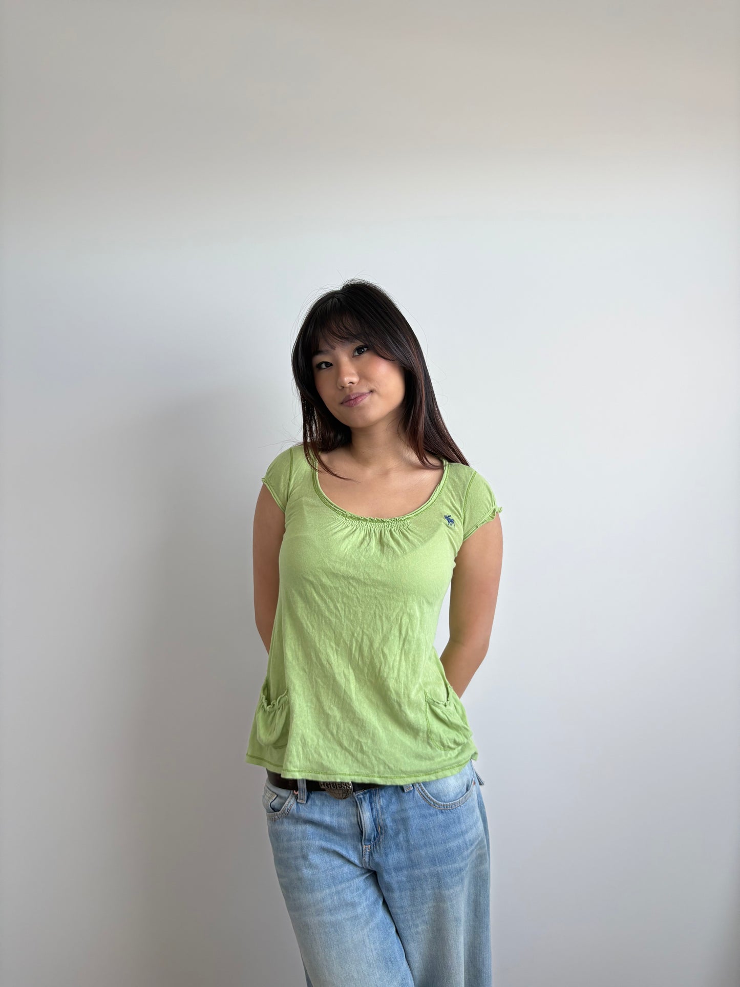 green abercrombie flowy top
