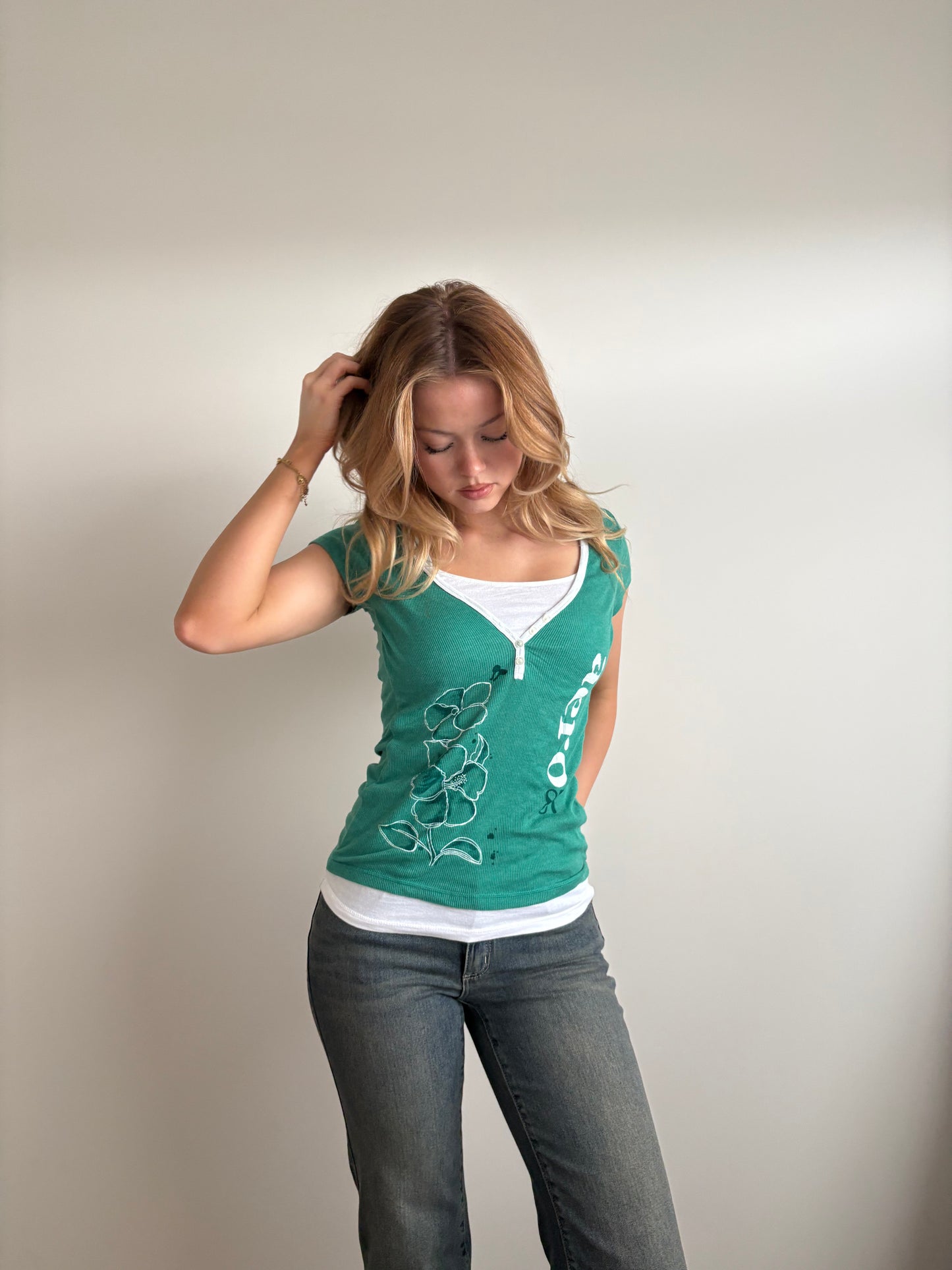 layered green and white aeropostale tee